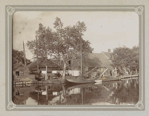 Farm with a barn and a haystack on a water, in the foreground a flat bottom, Folkert Idzes de Jong, c. 1905 - c. 1907 Canvas Print