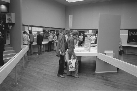 Visitors in a room with various objects, c. 1975 Canvas Print