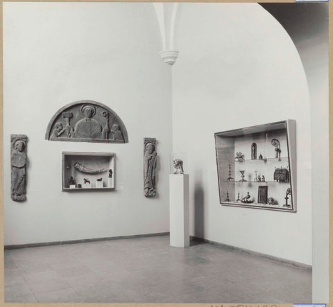 Hall with medieval sculptures including a tympanum and display case with a hunting horn, 1961 Canvas Print