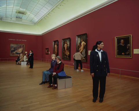 Room with paintings, 2 ushers and visitors on benches, c. 2003 Canvas Print