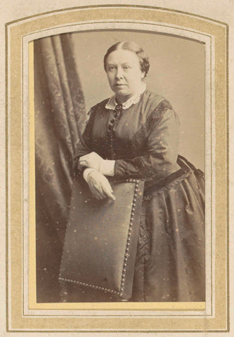 Portrait of a woman in a dress leaning on a chair, anonymous, c. 1860 - c. 1900 Canvas Print