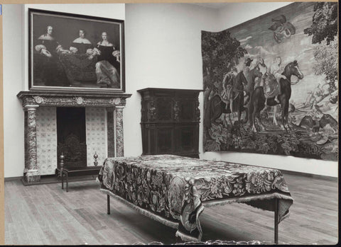 Room with tapestry, fireplace with painting, cupboard and table with upholstery, 1962 Canvas Print