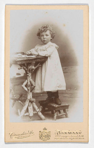 Portrait of a toddler with curls at a table, Camillus Franciscus van der Aa, 1895 - 1915 Canvas Print