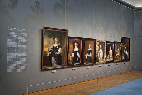 Wall with seven portraits of women and information text, 2011 Canvas Print