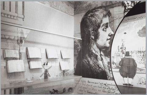 Wall display case with books next to inflated reproductions of engravings, c. 1991 Canvas Print