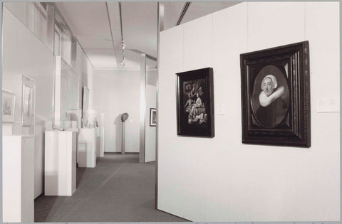 Room with various objects in display cases and two paintings, c. 1989 Canvas Print