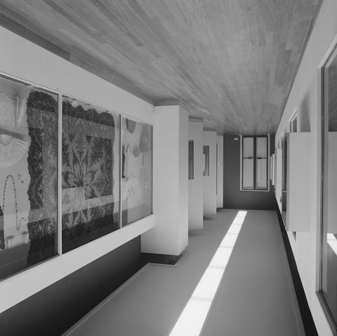 Elongated space with lace display cases, 1962 Canvas Print