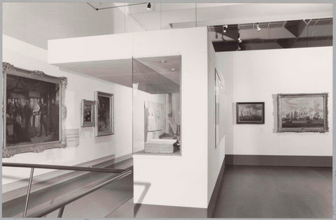 Room with paintings and a book in a display case, c. 1989 Canvas Print