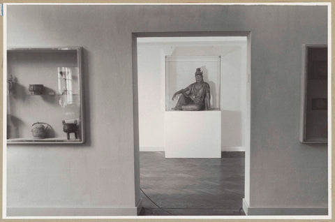 Passage between two wall display cases with a view of a wooden Guanyin, 1952 Canvas Print