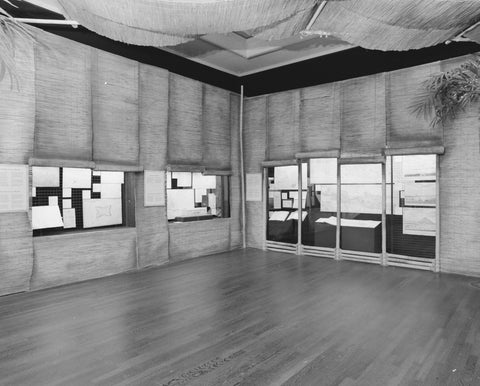 Room with wicker mats on the walls and documents in wall showcases, c. 1991 Canvas Print