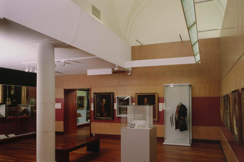 Room 108 with paintings and a display case in which a garment hangs, 2003 Canvas Print