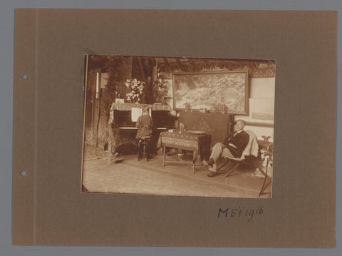 Girl at piano, man sitting in chair interior, c. 1916, anonymous, 1916 Canvas Print