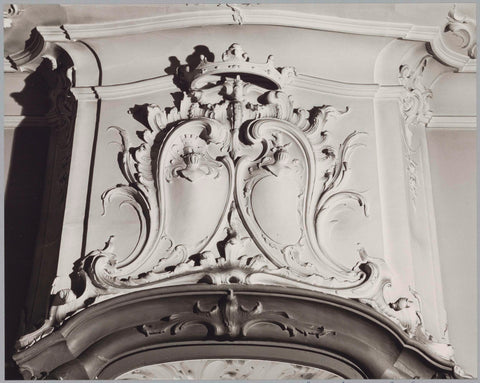 Ornament above display cabinet with leaf vines and a crown, 1981 Canvas Print