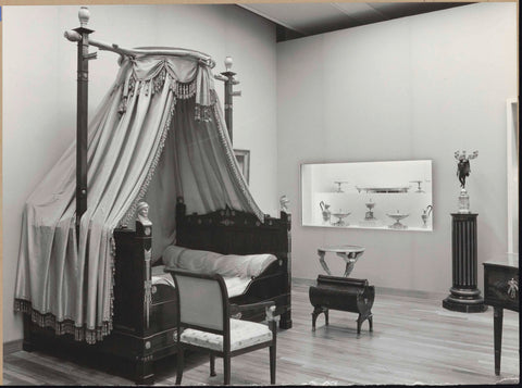 Room with a cot, display cases with silverware and furniture, 1962 Canvas Print