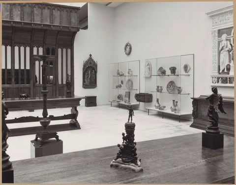 Room with ochre, furniture including two tables, majolica, statues and a chest, c. 1962 Canvas Print