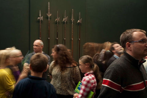 Visitors in front of a wall with four hellbezas and two partisans, 2009 Canvas Print