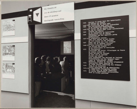 View of the entrance to a slide projection room with visitors, on the left photos of copper engravings and on the right a panel with historical information, c. 1975 Canvas Print