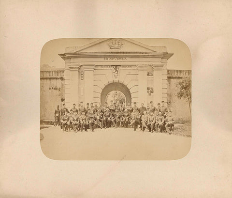 Group portrait of unknown KNIL non-commissioned officers in front of the gate of Fort Nieuw Victoria in Ambon, 1880, anonymous, 1880 Canvas Print