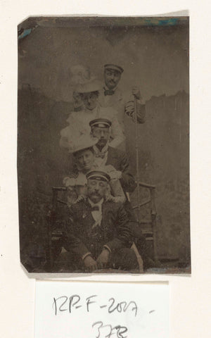 Group portrait of three men and two women, standing and sitting in front of a painted background cloth (mountain with castle) (Germany?), anonymous, c. 1880 - 1910 Canvas Print